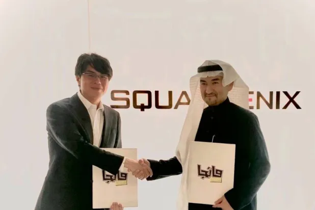 المدير العام رئيس تحرير «مانجا العربية» الدكتور عصام بخاري مع الرئيس والمدير التنفيذي لشركة «سكوير إنيكس» السيد تاكاشي كيريو (الشرق الأوسط)