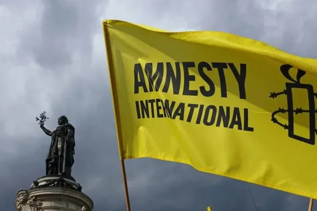 حذرت منظمة العفو الدولية من أن كأس العالم لكرة القدم يواجه خطر التحول (منظمة العفو الدولية)