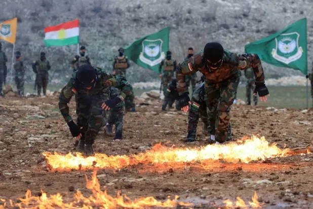 Military exercises by fighters from PJAK in Erbil, northern Iraq, on February 26 (Reuters) 