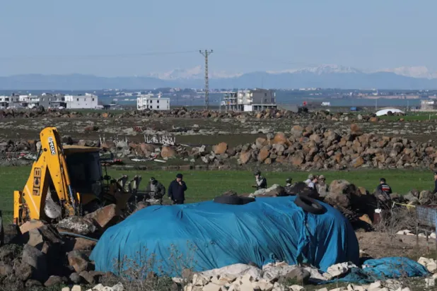 Turkish army personnel search a field after a piece of ammunition fell following the interception of a missile launched from Iran by a NATO air defense system, in Diyarbakir, Türkiye, March 9, 2026. REUTERS/Sertac Kayar/File Photo 