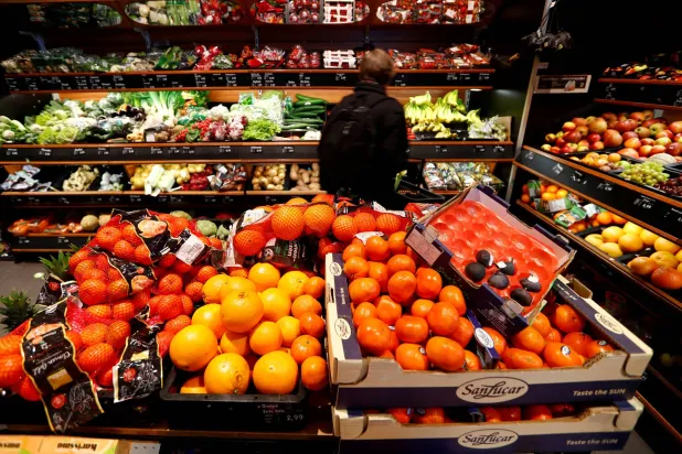 Shelves filled with fruit inside a supermarket in Berlin (Reuters)