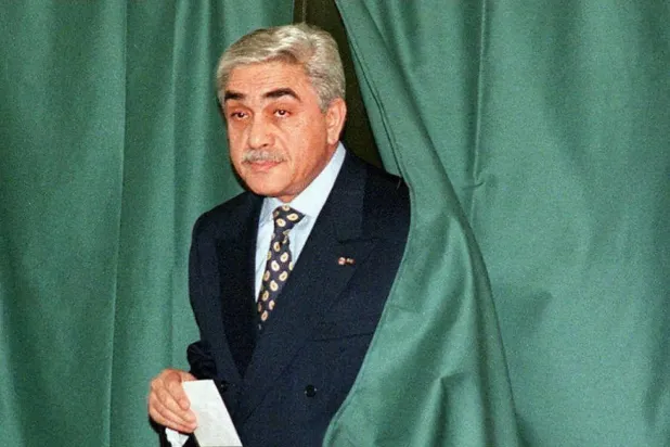 Former Algerian President Liamine Zeroual casts his vote in the 1997 parliamentary elections. (AFP) 