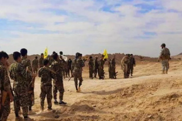 Members of the Iranian Revolutionary Guards in Syria (file photo)