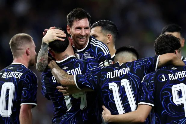Soccer Football - International Friendly - Argentina v Zambia - Estadio La Bombonera, Buenos Aires, Argentina - March 31, 2026 Argentina's Nicolas Otamendi celebrates scoring their third goal with Lionel Messi REUTERS/Agustin Marcarian 