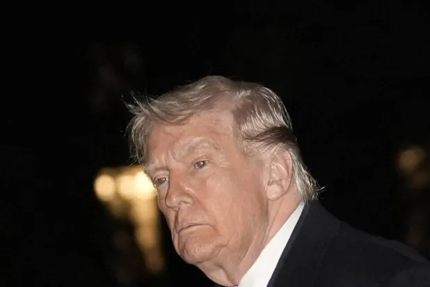 US President Donald Trump walks on the South Lawn of the White House upon his return to Washington, DC, USA, 29 March 2026. EPA