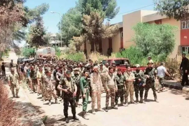 مرتزقة سوريون خلال مظاهرة للمطالبة برواتبهم المتأخرة في طرابلس قبل 4 أعوام (لقطة من تسجيل مصور)