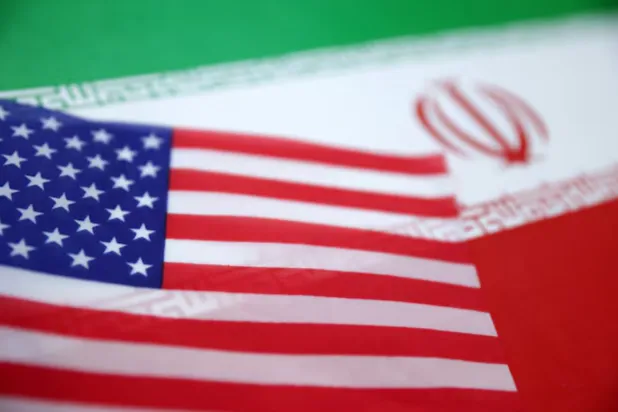 US and Iran flags are seen in this illustration taken June 18, 2025. REUTERS/Dado Ruvic/Illustration/File Photo 
