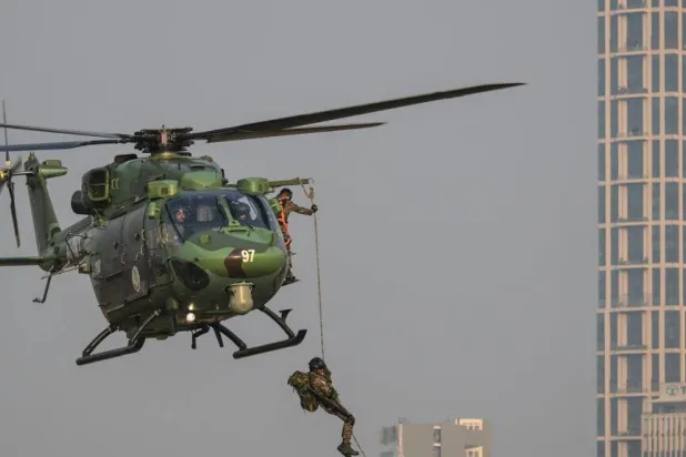 India said it exported more than $4 billion of defense equipment including missiles, boats and artillery. Dibyangshu SARKAR / AFP