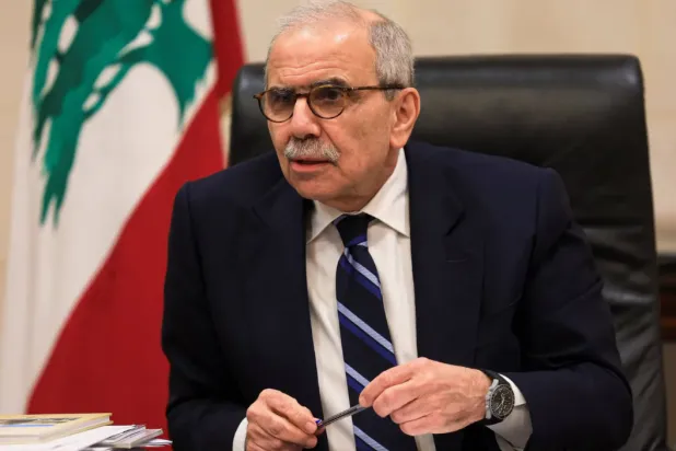 Lebanese Prime Minister Nawaf Salam speaks to reporters at the Grand Serail in Beirut, December 3, 2025. (Reuters)
