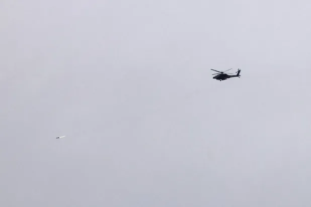 An Israeli helicopter flying in Israeli airspace near the border with Lebanon (EPA)