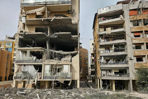 A photographs shows damaged buildings following an overnight Israeli airstrike in the Hadath neighborhood of Beirut's southern suburbs, on April 1, 2026. (AFP)