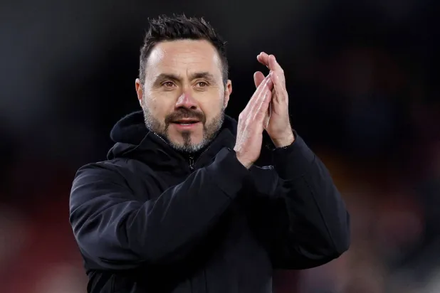 Football - Premier League - Brentford v Brighton & Hove Albion - Brentford Community Stadium, London, Britain - April 3, 2024 Brighton & Hove Albion manager Roberto De Zerbi applauds fans after the match. (Action Images via Reuters)