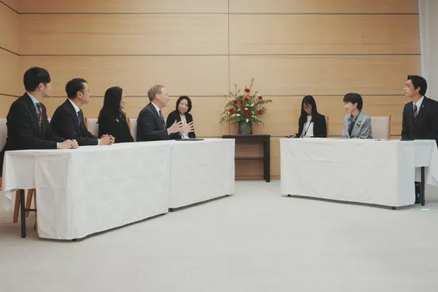 Microsoft's Vice Chair and President Brad Smith (4th L) and (L-R) Sakura Internet Inc President and CEO Kunihiro Tanaka, SoftBank Corp. President and CEO Junichi Miyakawa, Microsoft Japan President Miki Tsusaka, hold a meeitng with Japan's Prime Minister Sanae Takaichi (2nd R) and Vice Minister of Economy, Trade and Industry Toshiro Ino (R) at the Prime Minister's Office in Tokyo on April 3, 2026. Kazuhiro NOGI / POOL/AFP
