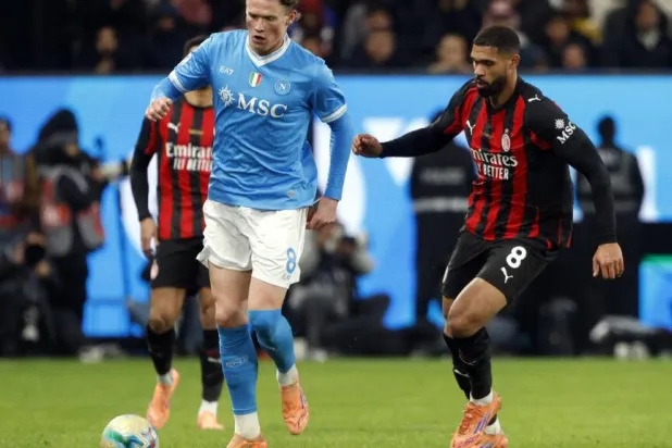 Napoli and AC Milan will be looking to close the gap on Serie A leaders Inter Milan. Fayez Nureldine / AFP/File
