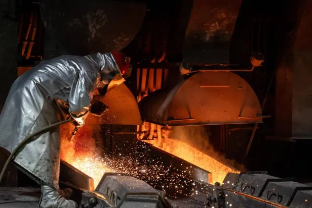 Smelter workers process copper at the Glogow plant in southwestern Poland, owned by KGHM. Wojtek RADWANSKI / AFP
