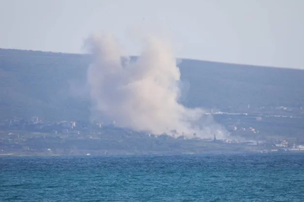 This picture taken from the southern Lebanese area of Tyre shows smoke rising from the site of an Israeli airstrike that targeted the area of Naqoura on March 31, 2026. (AFP)