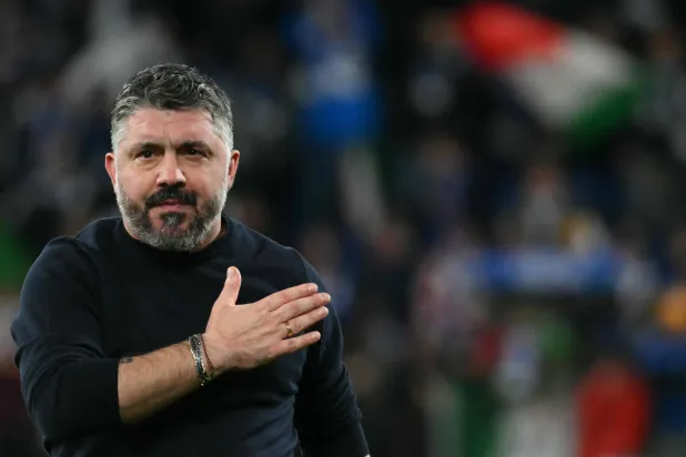 Italy's head coach Gennaro Gattuso greets supporters after winning the playoff FIFA World Cup 2026 European qualification semifinal football match between Italy and North Ireland at the Gewiss stadium in Bergamo, on March 26, 2026. (AFP)