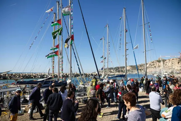 Activists gather in l'Estaque, part of Marseille's harbor, southern France, on April 4, 2026, during a rally in support of a flotilla carrying activists from “Thousand Madleens to Gaza” movement as they prepare to set sail. (AFP) 
