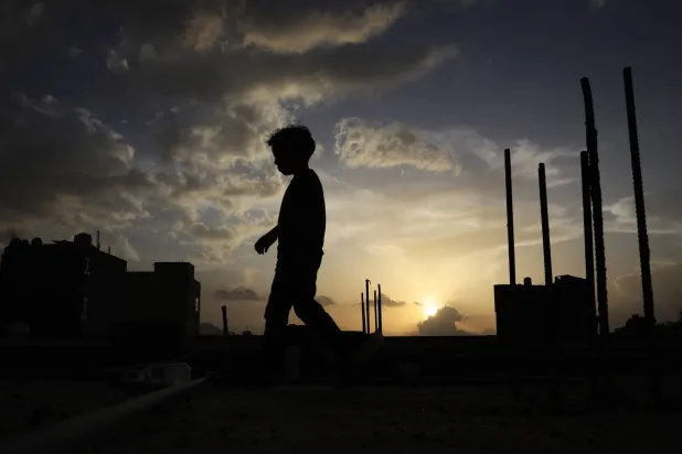 The light of the setting sun illuminates some clouds in the sky over Sanaa, Yemen, 30 March 2026. (EPA)