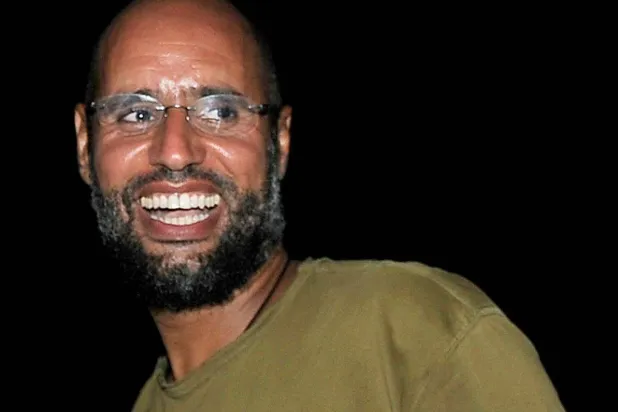 سيف الإسلام القذافي في لقاء سابق بالعاصمة طرابلس يوم 23 أغسطس 2011 (رويترز)