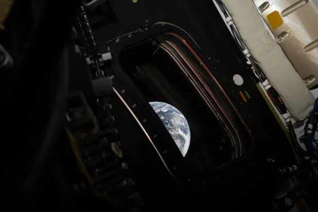 03 April 2026: A partial views of Earth taken by NASA astronaut and Artemis II Commander Reid Wiseman from a window on the Orion spacecraft as it heads to the Moon. The picture was released on the third day of the first mission since 1972 to send people around the moon. Photo: Reid Wiseman/Nasa/Planet Pix via ZUMA Press Wire/dpa