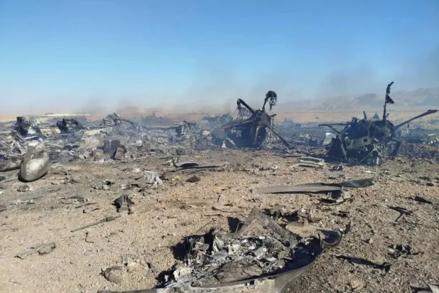 In this image provided by Sepahnews, the Iranian Revolutionary Guard's official website, wreckage is shown at what Iran's state TV claimed was the site of a downed American transport plane and two helicopters involved in a rescue operation, in Isfahan province, Iran, April 2026. (Sepahnews via AP) 