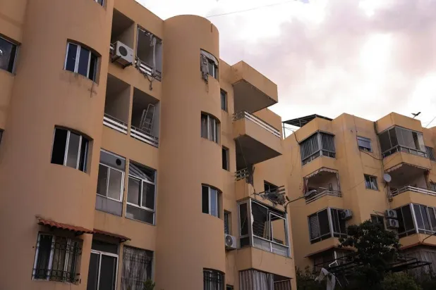  The exterior of an apartment building hit by an Israeli strike amid escalating hostilities between Israel and Hezbollah, as the US-Israel conflict with Iran continues, in Ain Saadeh, Lebanon, April 6, 2026. (Reuters)