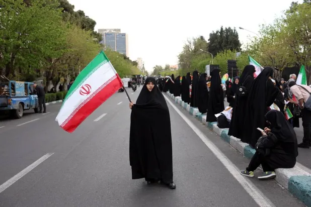 Women take part during a ceremony for the memorial of Minab school children who were killed in an airstrike on 28 February, in Tehran, Iran, 07 April 2026. (EPA)