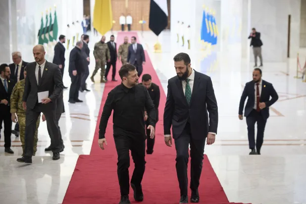 A handout photo made available by Presidential Press Service shows Ukrainian President Volodymyr Zelenskyy (L) and Syrian President Ahmed al-Sharaa (R) during their meeting in Damascus, Syria, 05 April 2026. (EPA/Presidential Press Service) 