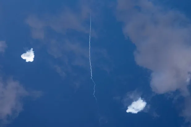 FILED - 18 March 2026, Qatar, Doha: The Qatari Armed Forces launch interceptor missiles into the sky over Doha to intercept incoming Iranian missiles. Photo: Stringer/dpa