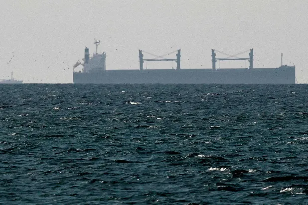 A cargo ship in the Arabian Gulf near the Strait of Hormuz (Reuters)