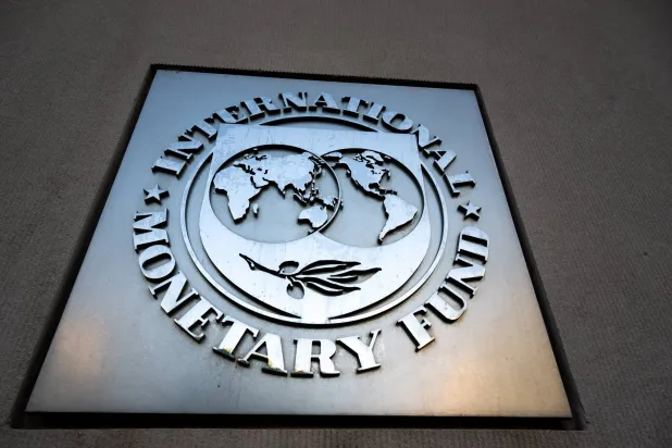 FILED - 24 October 2024, US, Washington: The logo of the International Monetary Fund (IMF) is pictured on the facade of the conference building on Pennsylvania Street. Photo: Soeren Stache/dpa