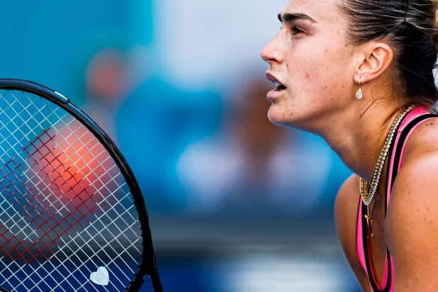 MIAMI GARDENS, FLORIDA - MARCH 28: Aryna Sabalenka returns a shot against Coco Gauff of the United States during the Women's Singles Final on Day 12 of the Miami Open Presented by Itau at Hard Rock Stadium on March 28, 2026 in Miami Gardens, Florida.   Carmen Mandato/Getty Images/AFP 