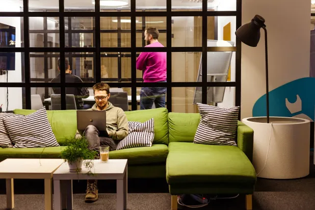 FILE PHOTO: Employees work in the Vinted headquarters in Vilnius, Lithuania November 26, 2019. Vinted-Investment/Handout via REUTERS 