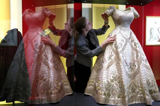 The coronation dress of Britain’s Queen Elizabeth II worn in 1953 is displayed at the exhibition “Queen Elizabeth II: Her Life in Style” at The King’s Gallery, Buckingham Palace in London, Britain, 09 April 2026. (EPA) 