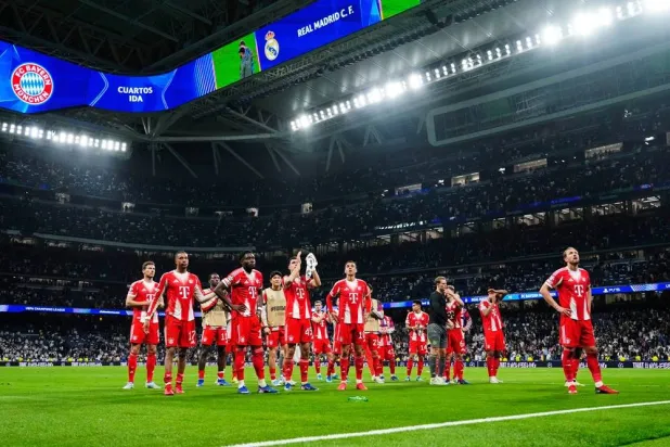  Bayern players greet fans after the Champions League quarterfinal first leg match between Real Madrid and Bayern Munich in Madrid, Spain, Tuesday, April 7, 2026. (AP) 