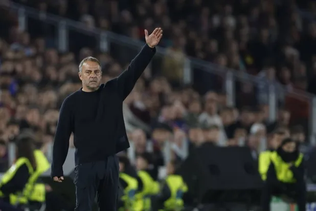 Barcelona's head coach Hansi Flick gestures during the UEFA Champions League quarter-final first leg match between FC Barcelona and Atletico Madrid, in Barcelona, Spain, 08 April 2026. (EPA)