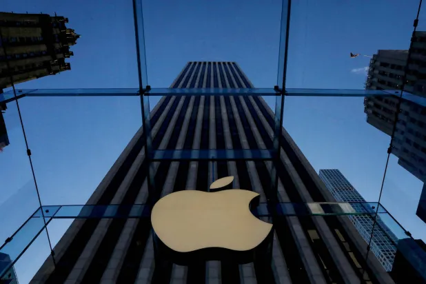 FILE PHOTO: The Apple logo is seen during the preview of the redesigned and reimagined Apple Fifth Avenue store in New York, US, September 19, 2019. REUTERS/Brendan McDermid/File Photo