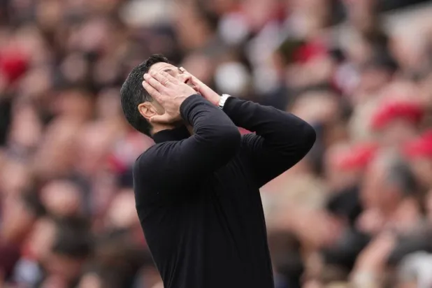 Arsenal's manager Mikel Arteta reacts during the Premier League soccer match between Arsenal and Bournemouth in London, England Saturday, April 11, 2026. (AP)
