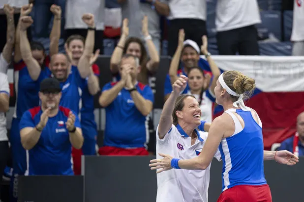 Czech Republic's Marie Bouzkova (R) and team captain Barbora Strycova celebrate winning their Billie Jean King Cup qualifiers round between Switzerland and Czech Republic in Biel, Switzerland, 11 April 2026. EPA/PETER SCHNEIDER