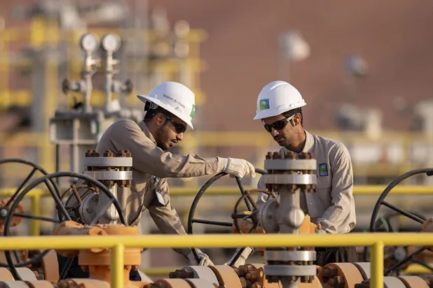 Two Aramco employees at one of the company's facilities (Aramco)