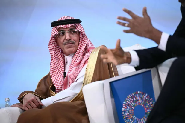 الجدعان مشاركاً في اجتماعات الخريف (أ.ف.ب)