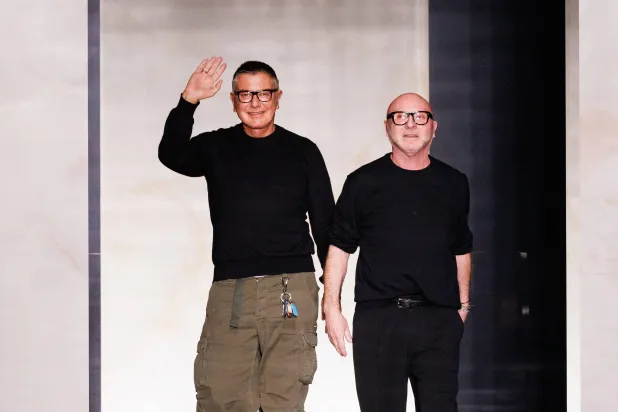 17 January 2026, Italy, Milan: Stefano Gabbana (L) and Domenico Dolce wave and smile at Milan Fashion Week. Photo: Cinzia Camela/Alamy/Pa/PA Wire/dpa 