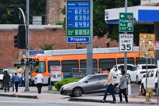 Gas prices are displayed at a Chevron station in Los Angeles, California, on March 31, 2026,(Photo by Frederic J. BROWN / AFP)