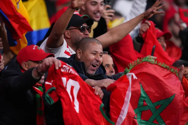 Moroccan fans cheer during a friendly soccer match between Morocco and Ecuador in Madrid, Spain, Friday, March 27, 2026. (AP Photo/Manu Fernandez)