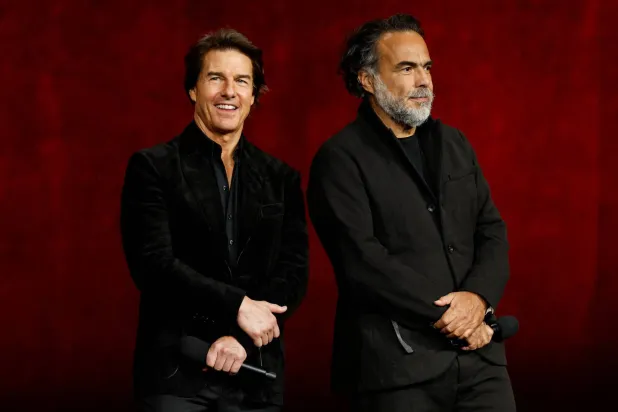  Cast member Tom Cruise and director Alejandro Gonzalez Inarritu of the upcoming film "Digger" react during the Warner Bros. Pictures presentation at CinemaCon, the official convention of Cinema United, in Las Vegas, Nevada, US, April 14, 2026. (Reuters)