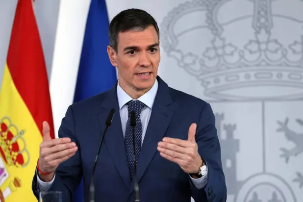 Spain's Prime Minister Pedro Sanchez gestures as he speaks during a press conference in Madrid. (AFP) 