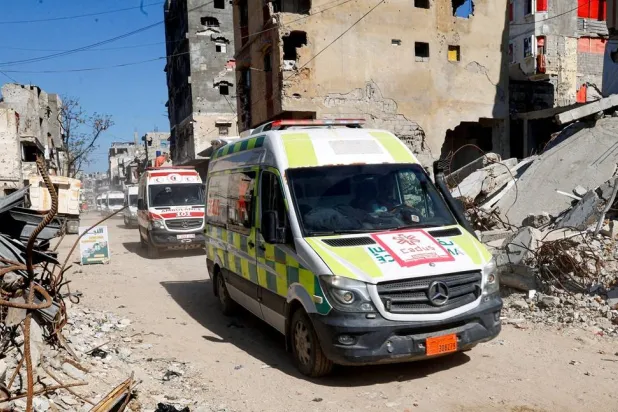 A convoy carrying wounded Palestinians from Gaza for treatment through the Rafah border crossing between Gaza and Egypt, after it was reopened by Israel on Sunday for a limited number of people, rides through Khan Younis in the southern Gaza Strip, April 12, 2026. (Reuters)
