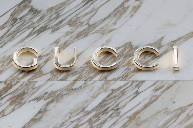A logo of fashion house Gucci is seen outside a shop in Paris, France, April 15, 2024. (Reuters)
