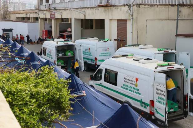 Mortuary vans are parked in front of a hospital morgue, after a deadly shooting at a school, in Kahramanmaras, Turkey, April 16, 2026. REUTERS/Ensar Ozdemir